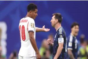 الإنجليزي جود بيلينغهام والأرجنتيني ليونيل ميسي (Getty)